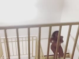 Lil nekkid hoe running down some steps