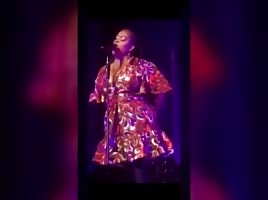 SINGER JILL SCOTT  SHOWING HOW HER HEAD GAME IS.