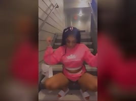 Baddie outside on the stairs 