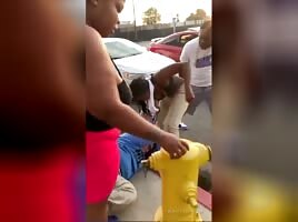 A stupid girl shows off her big breasts during a fight